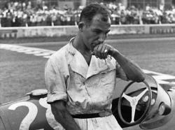 Stirling Moss is first Englishman to win the British Grand Prix