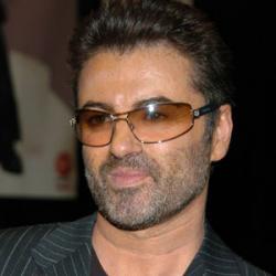George Michael Crashes into Snappy Snaps