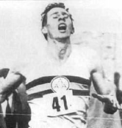 Roger Bannister runs the four minute mile